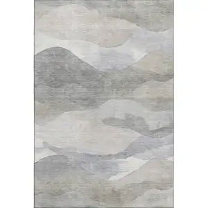 Photo of Beige Gray And Ivory Abstract Washable Area Rug With UV Protection