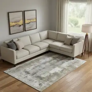 Photo of Beige Gray And Ivory Abstract Washable Area Rug With UV Protection