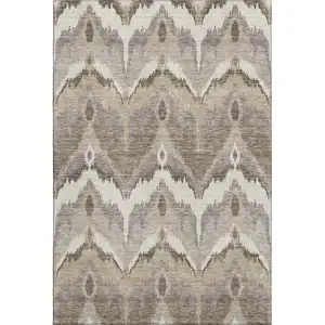 Photo of Beige Gray And Ivory Ikat Washable Area Rug With UV Protection