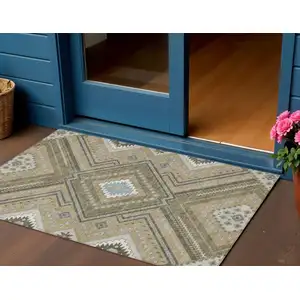 Photo of Beige Gray And Ivory Tribal Washable Indoor Outdoor Area Rug