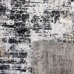 Photo of Beige Gray and White Abstract Area Rug