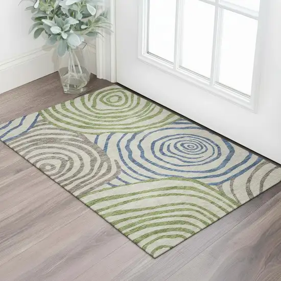 Beige Green And Blue Abstract Washable Area Rug With UV Protection Photo 1