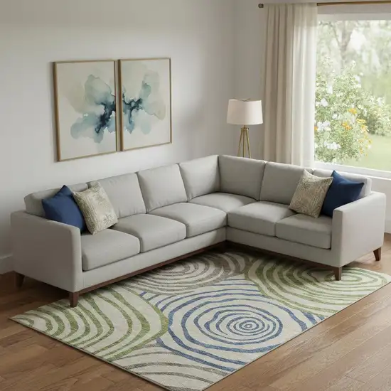 Beige Green And Blue Abstract Washable Area Rug With UV Protection Photo 1