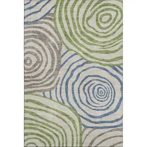 Photo of Beige Green And Blue Abstract Washable Area Rug With UV Protection