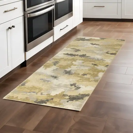 2' X 8' Beige Grey And Gold Abstract Power Loom Stain Resistant Runner Rug Photo 1