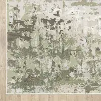 Photo of Beige Grey Brown And Sage Green Abstract Power Loom Stain Resistant Area Rug