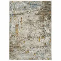 Photo of Beige Grey Brown Gold Red And Blue Abstract Power Loom Stain Resistant Area Rug With Fringe