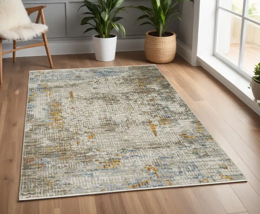 Beige Grey Brown Gold Red And Blue Abstract Power Loom Stain Resistant Area Rug With Fringe Photo 1