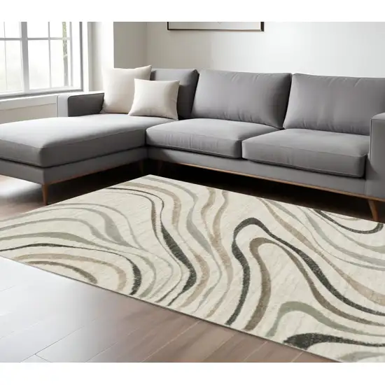 Beige Grey Brown Sage Pale Blue Tan And Charcoal Abstract Power Loom Stain Resistant Area Rug Photo 1