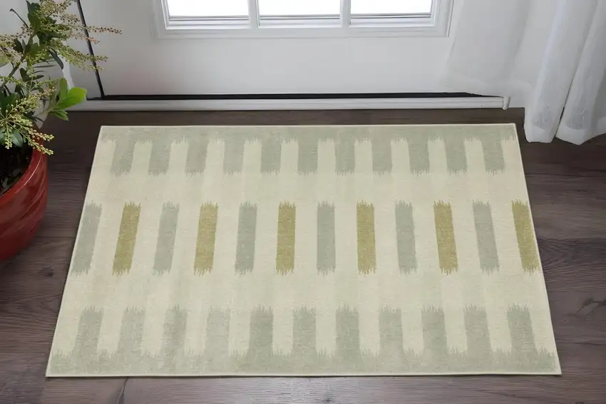 Beige Grey Gold And Green Geometric Power Loom Stain Resistant Area Rug Photo 1
