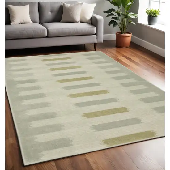 Beige Grey Gold And Green Geometric Power Loom Stain Resistant Area Rug Photo 1