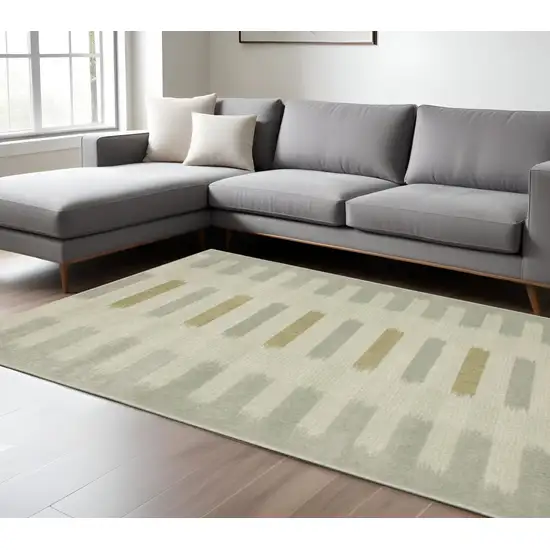Beige And Ivory Geometric Area Rug Photo 1