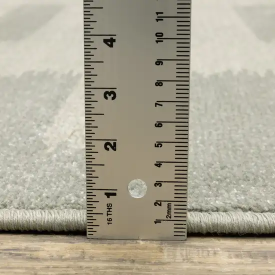 2' X 8' Beige Grey Gold And Green Geometric Power Loom Stain Resistant Runner Rug Photo 8