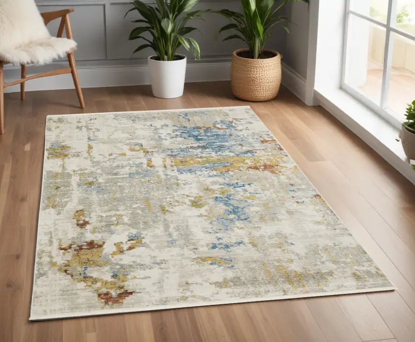 Beige Grey Gold Blue Rust And Teal Abstract Power Loom Stain Resistant Area Rug With Fringe Photo 1