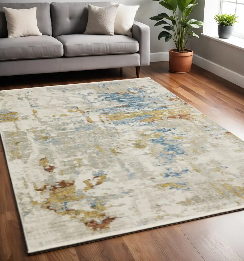 Beige Grey Gold Blue Rust And Teal Abstract Power Loom Stain Resistant Area Rug With Fringe Photo 1
