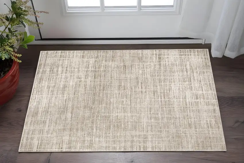 Beige Grey Ivory Tan And Brown Abstract Power Loom Stain Resistant Area Rug Photo 1