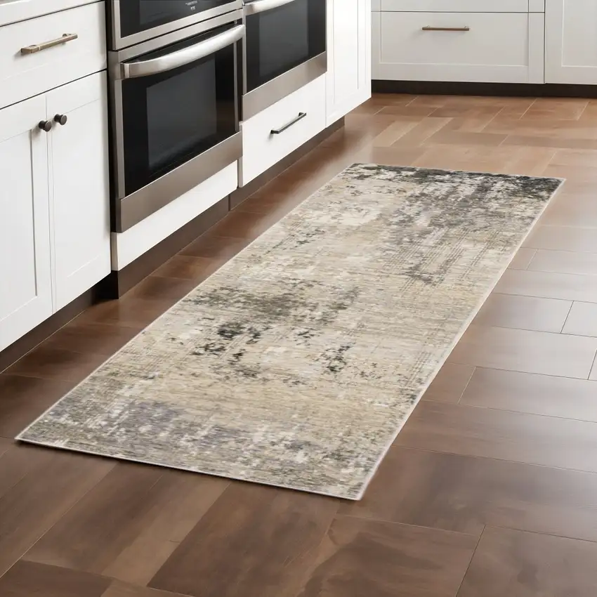 2' X 8' Beige Grey Ivory Tan And Brown Abstract Power Loom Stain Resistant Runner Rug Photo 1