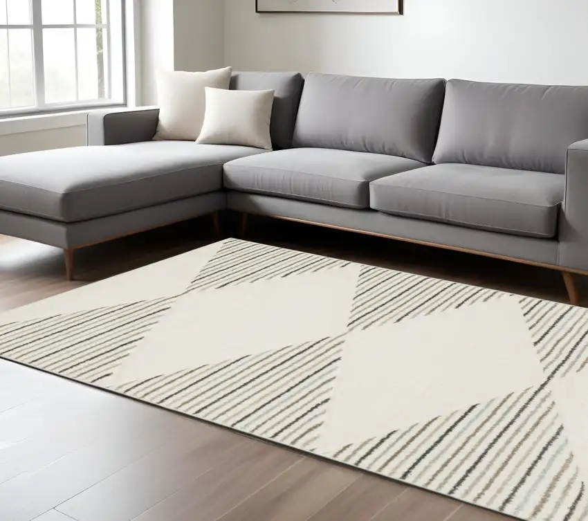6' X 9' Beige Grey Sage Green Pale Blue Brown And Charcoal Geometric Power Loom Stain Resistant Area Rug Photo 1