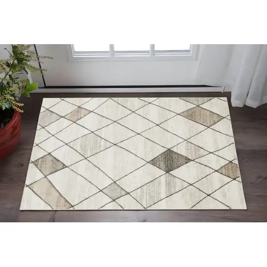 Beige Grey Tan And Brown Geometric Power Loom Stain Resistant Area Rug Photo 1