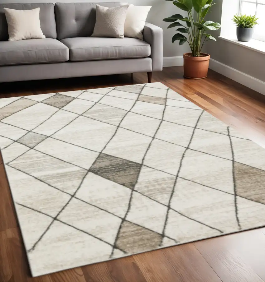 Beige Grey Tan And Brown Geometric Power Loom Stain Resistant Area Rug Photo 1