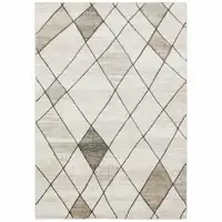 Photo of Beige Grey Tan And Brown Geometric Power Loom Stain Resistant Area Rug