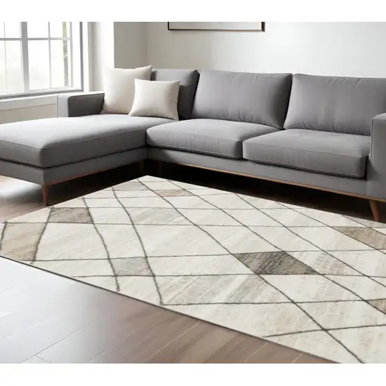 Beige Grey Tan And Brown Geometric Power Loom Stain Resistant Area Rug Photo 1