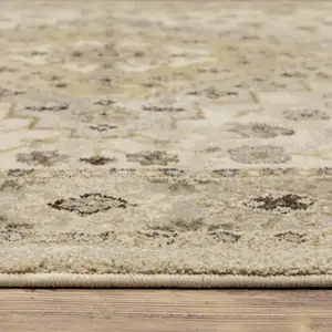 Photo of Beige Grey Tan And Brown Oriental Power Loom Stain Resistant Area Rug