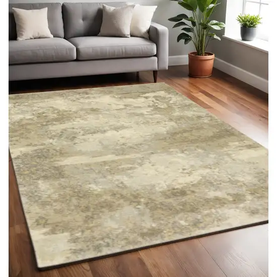 Beige and Gold Abstract Power Loom Area Rug Photo 1