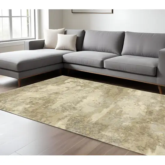 Beige and Gold Abstract Power Loom Area Rug Photo 1