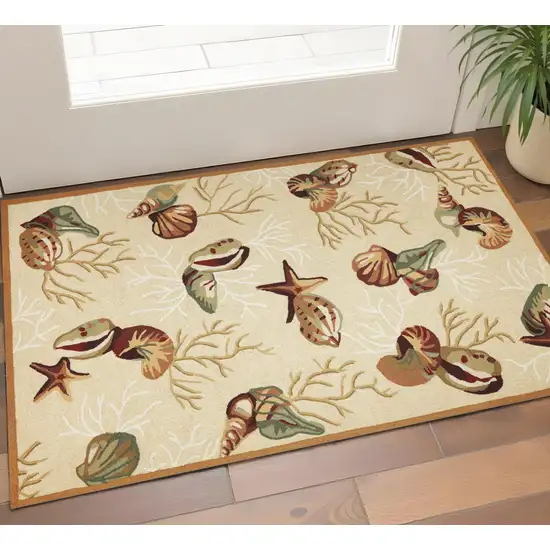 Beige Green And Brown Seashell and Coral Hand Tufted Area Rug Photo 1