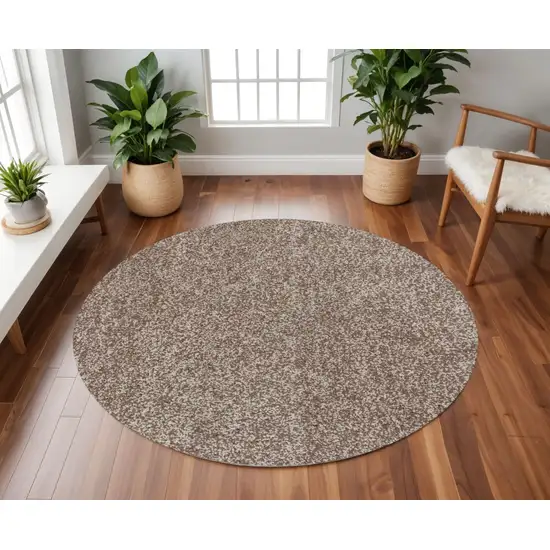 8' Beige And Brown Abstract Hand Woven Round Rug Photo 1