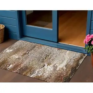 Photo of Beige Ivory And Black Abstract Washable Indoor Outdoor Area Rug