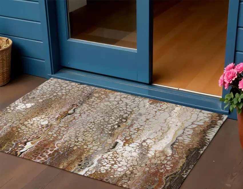 Beige Ivory And Black Abstract Washable Indoor Outdoor Area Rug Photo 1