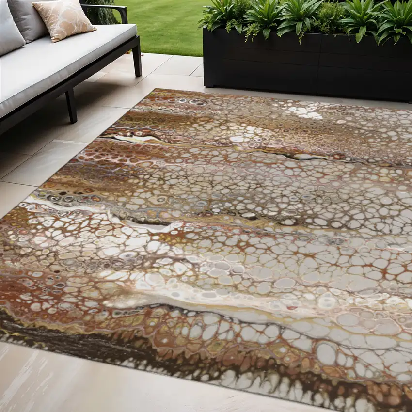 Beige Ivory And Black Abstract Washable Indoor Outdoor Area Rug Photo 1