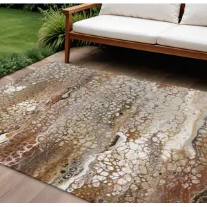 Photo of Beige Ivory And Black Abstract Washable Indoor Outdoor Area Rug