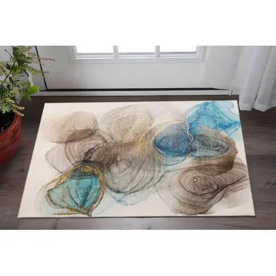 Beige Ivory And Blue Abstract Washable Area Rug With UV Protection Photo 2