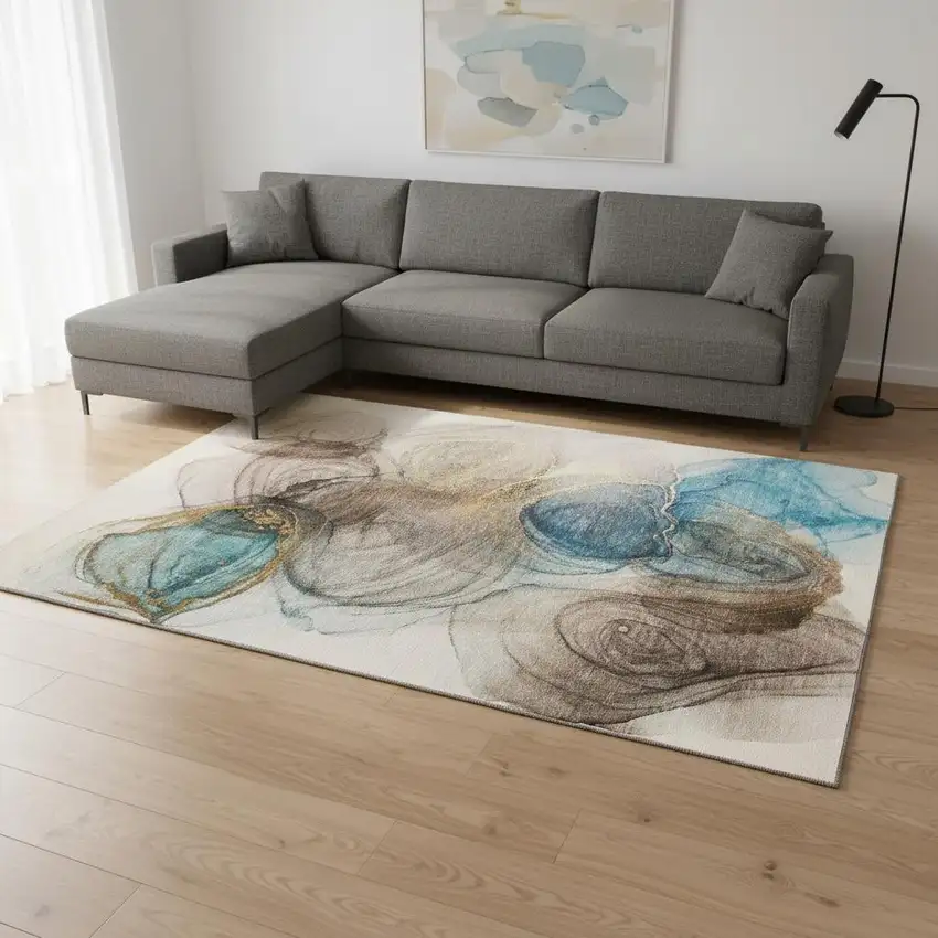 Beige Ivory And Blue Abstract Washable Area Rug With UV Protection Photo 1