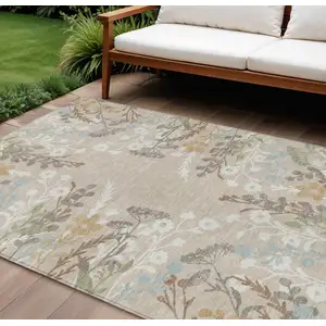 Photo of Beige Ivory And Blue Floral Washable Indoor Outdoor Area Rug