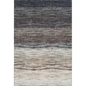 Photo of Beige Ivory And Blue Ombre Washable Area Rug With UV Protection