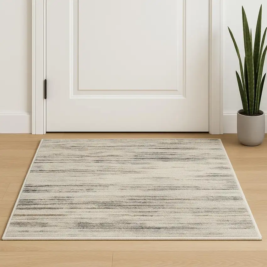 Beige Ivory And Brown Abstract Distressed Area Rug Photo 1