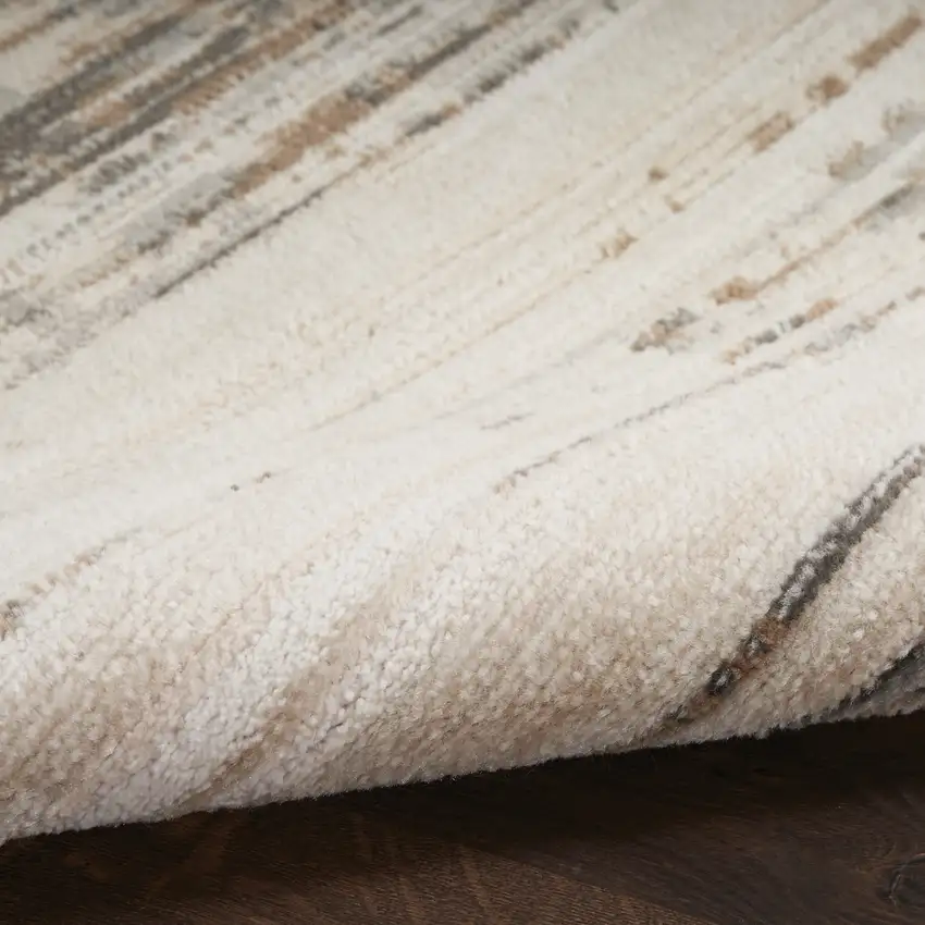 Beige Ivory And Brown Abstract Distressed Area Rug Photo 9