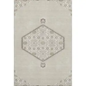 Photo of Beige Ivory And Brown Oriental Washable Area Rug With UV Protection