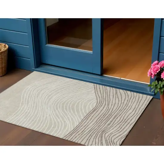 Beige Ivory And Brown Striped Washable Indoor Outdoor Area Rug Photo 1