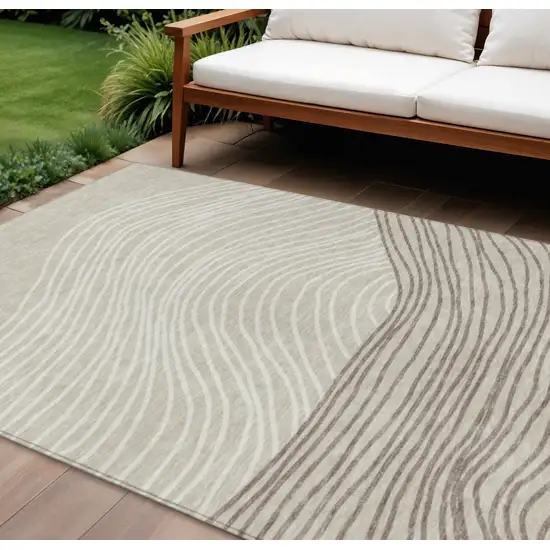 Beige Ivory And Brown Striped Washable Indoor Outdoor Area Rug Photo 1