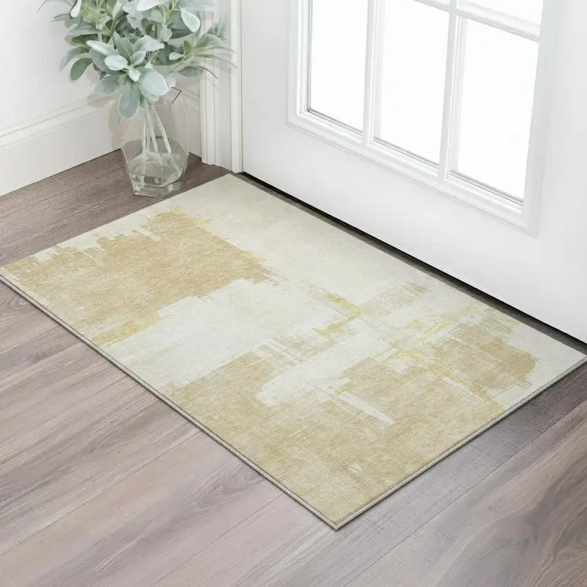 Beige Ivory And Gold Abstract Washable Area Rug With UV Protection Photo 2