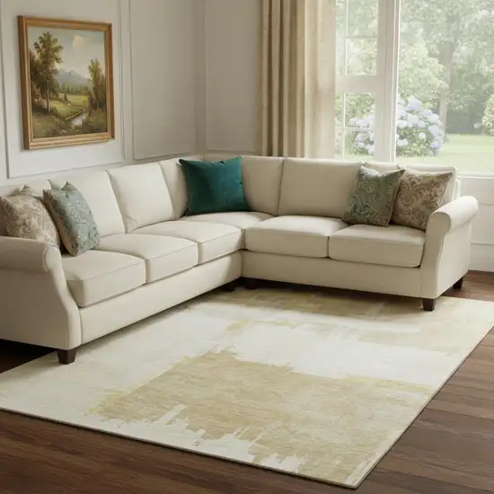 Beige Ivory And Gold Abstract Washable Area Rug With UV Protection Photo 1