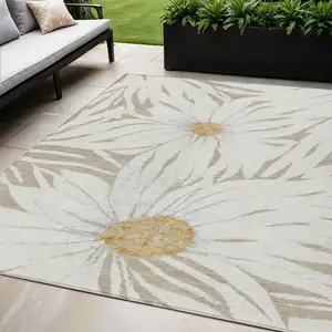 Photo of Beige Ivory And Gold Floral Washable Indoor Outdoor Area Rug