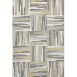 Photo of Beige Ivory And Gold Geometric Washable Area Rug With UV Protection
