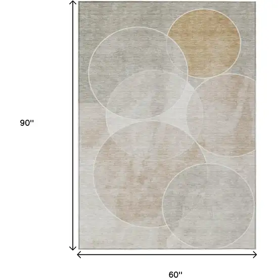 Beige Ivory And Gold Geometric Washable Indoor Outdoor Area Rug Photo 3