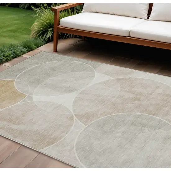 Beige Ivory And Gold Geometric Washable Indoor Outdoor Area Rug Photo 1
